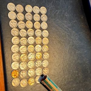 One roll of  90% silver Mercury dimes